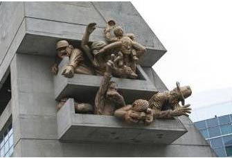 One of a series of sculptures of workers on office buildings in Totonto